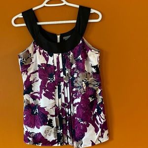 Ann Taylor blouse in size extra small. Purple, beige and white floral detailing.